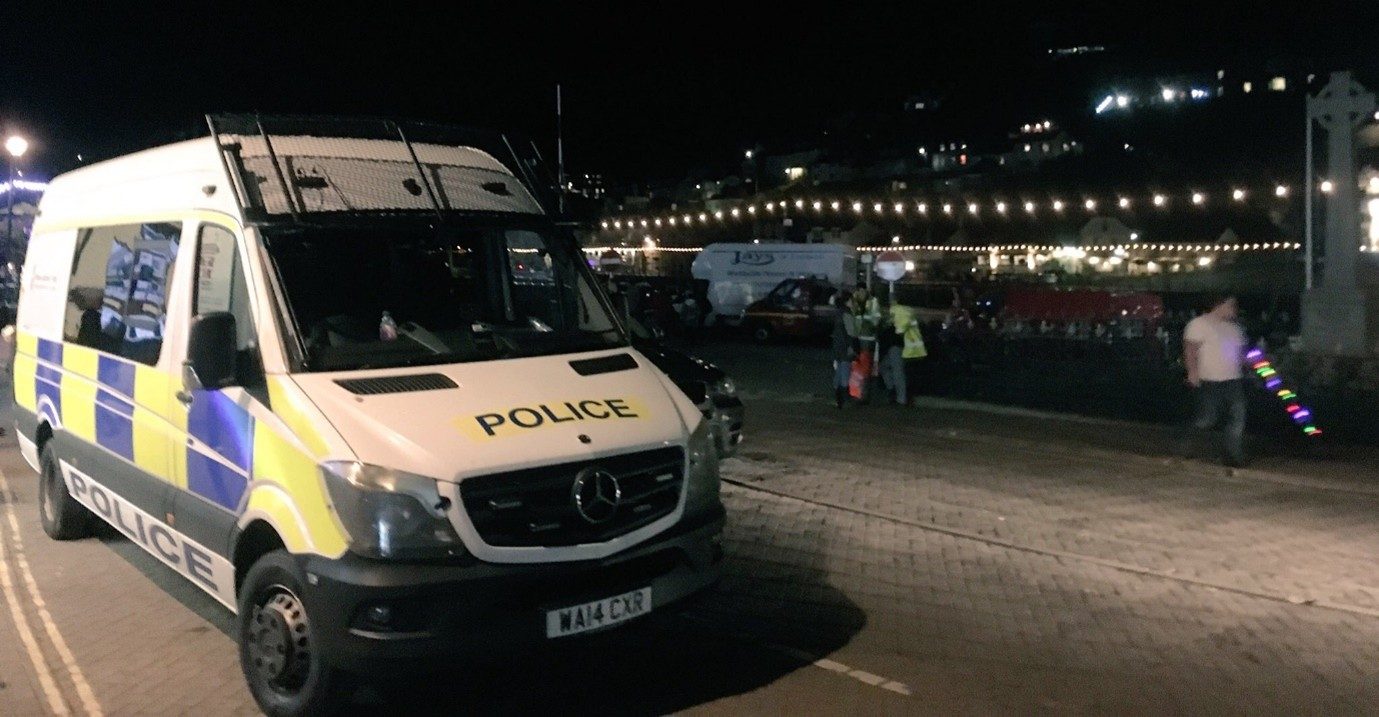 Police van on duty in a Cornish town at night